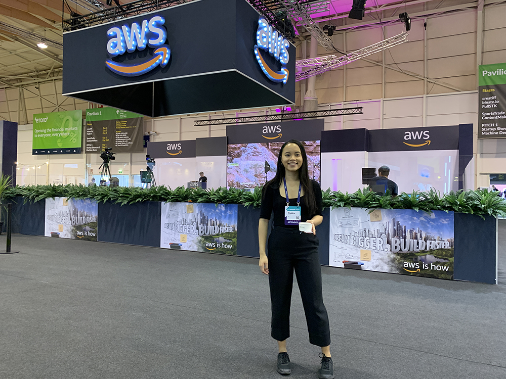 Pauline posing by the AWS area